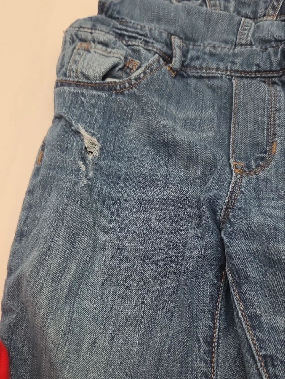 GAP denim garment in classic blue with contrast stitching